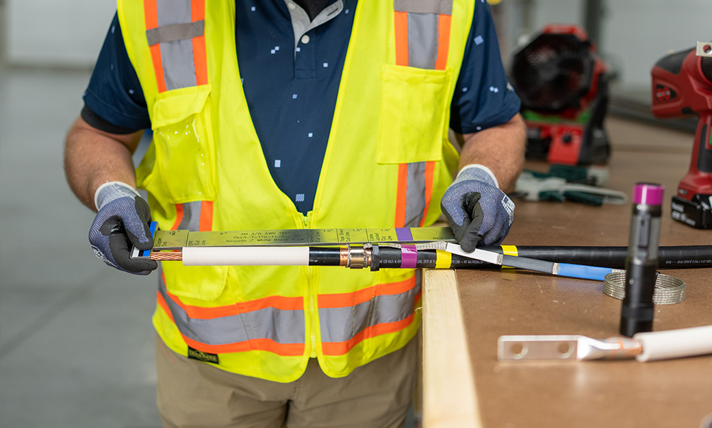 Medium Voltage Services Employee working on an inspection